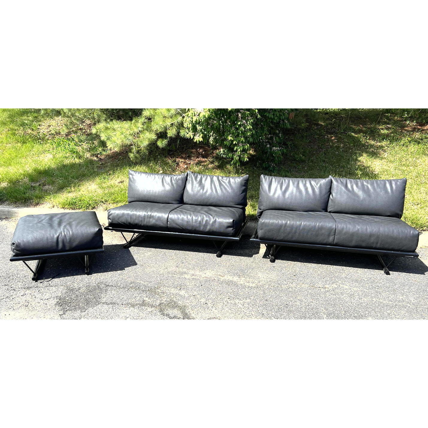 Appraisal: pcs Ligne Roset Black vinyl couch and chair Pebbled vinyl