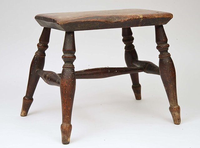 Appraisal: A SMALL RECTANGULAR ELM TOPPED STOOL standing on turned tapering