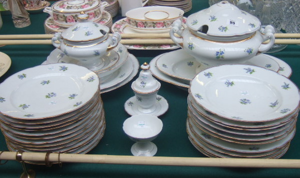 Appraisal: A continental white porcelain part dinner service decorated with sprays