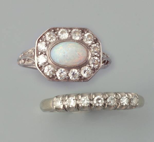 Appraisal: An opal diamond and platinum ring together with a diamond