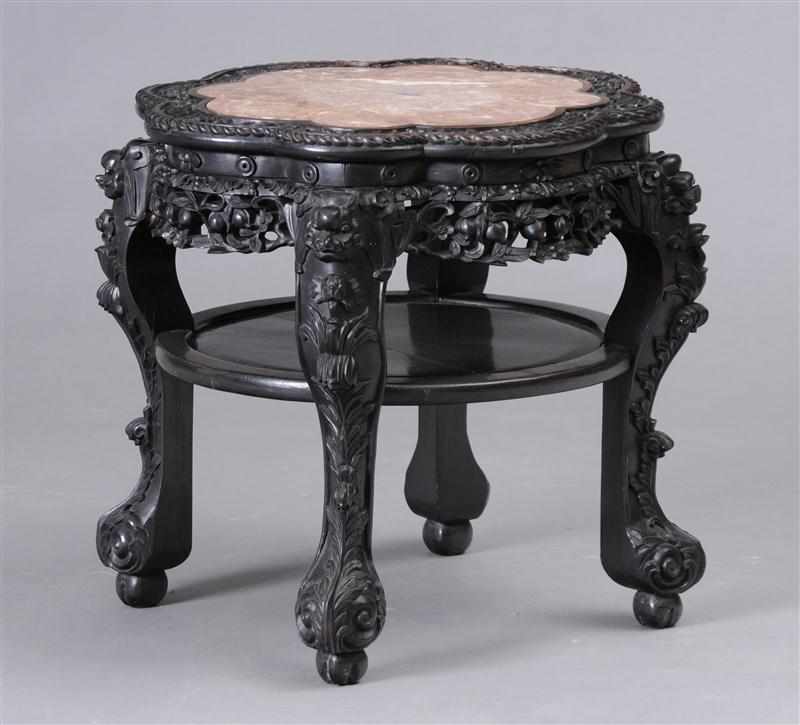 Appraisal: CHINESE CARVED ROSEWOOD MARBLE-INSET JARDINI RE STAND The octafoil top