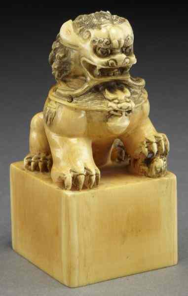 Appraisal: Chinese carved ivory seal depicting a foo lion International buyers