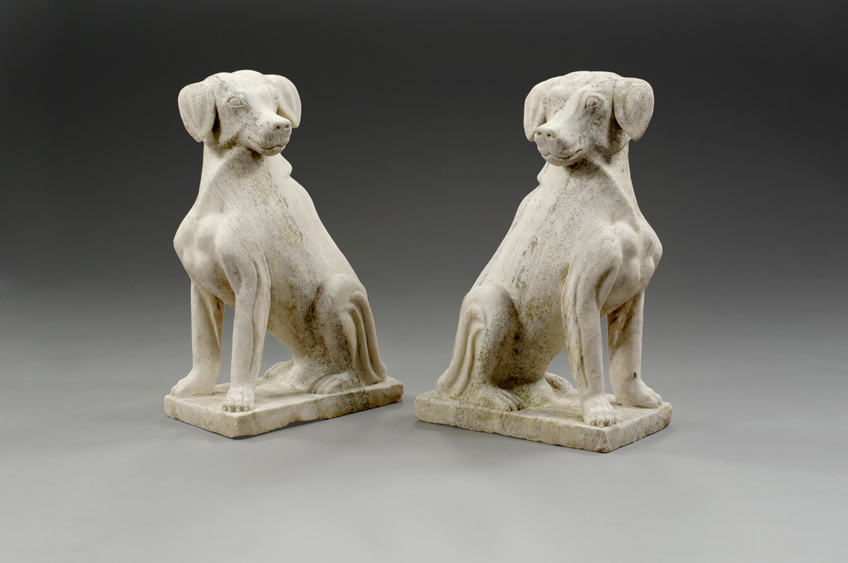 Appraisal: PAIR OF CARVED MARBLE FIGURES OF HOUNDS ON RECTANGULAR PLINTH