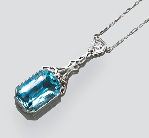 Appraisal: An aquamarine and diamond necklace suspending a modified rectangular-cut aquamarine