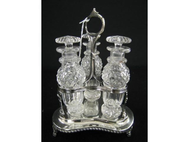 Appraisal: Georgian English Sterling Castor Set a trio of cut crystal