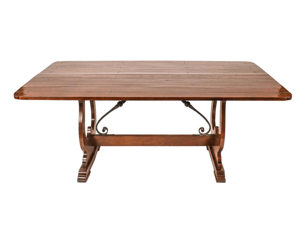 Appraisal: SPANISH REVIVAL STYLE WALNUT TABLEwith hinged plank top and iron