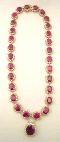 Appraisal: K yellow gold ruby and diamond dinner necklace long with