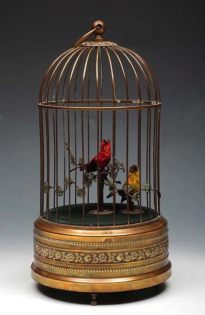 Appraisal: A CONTINENTAL SINGING BIRD AUTOMATION MUSICAL BOX the two birds