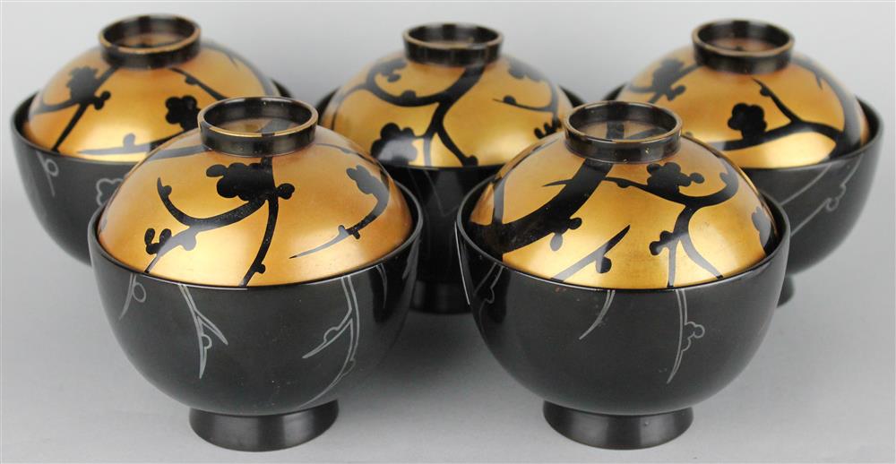 Appraisal: FIVE JAPANESE BLACK LACQUER AND GILT COVERED BOWLS depicting prunus