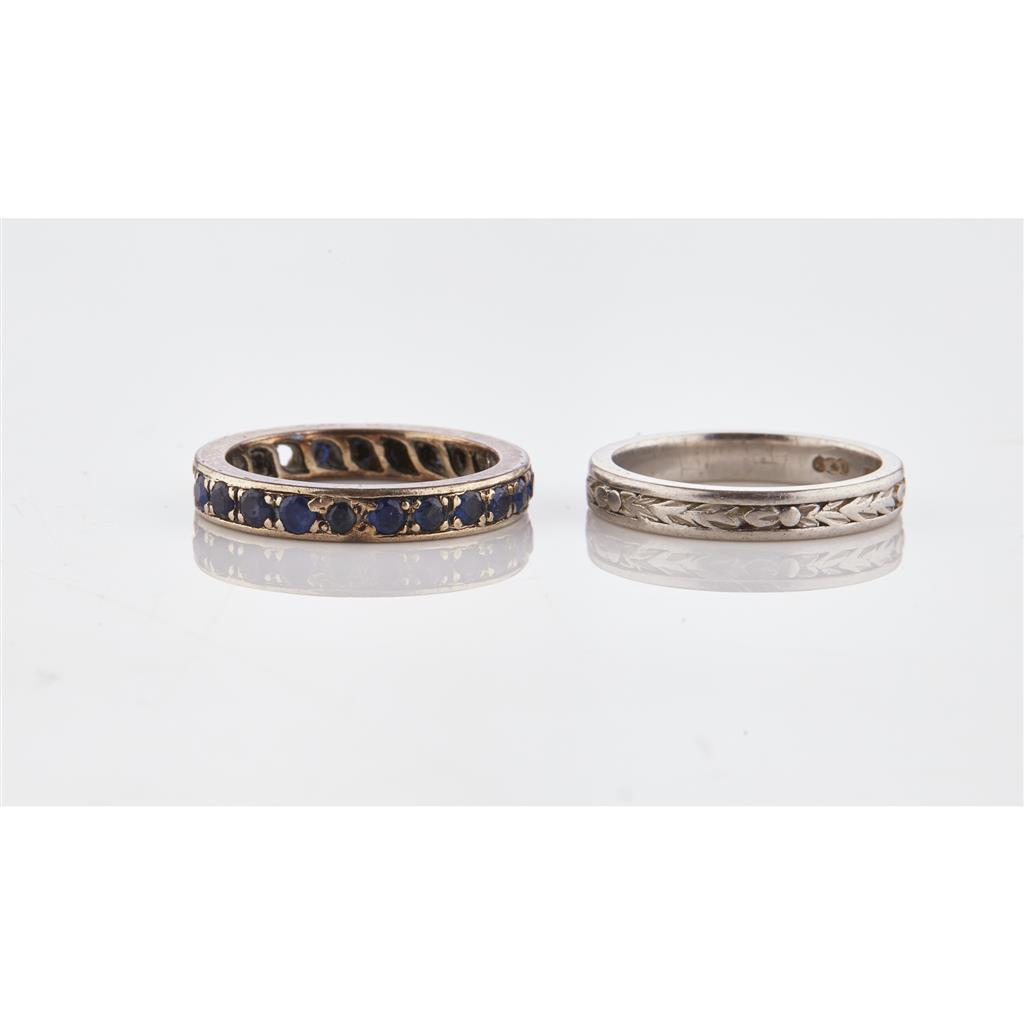 Appraisal: A sapphire set eternity ring claw set with a single