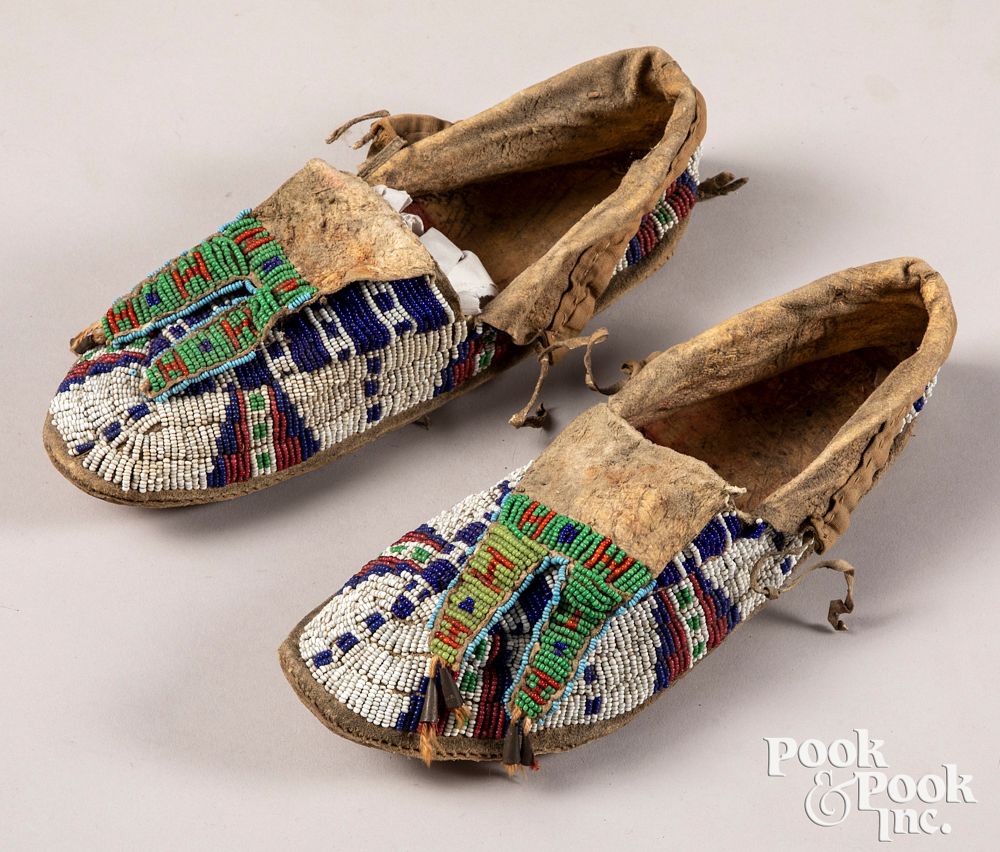 Appraisal: Pair of Plains Indian beaded moccasins Pair of Plains Indian