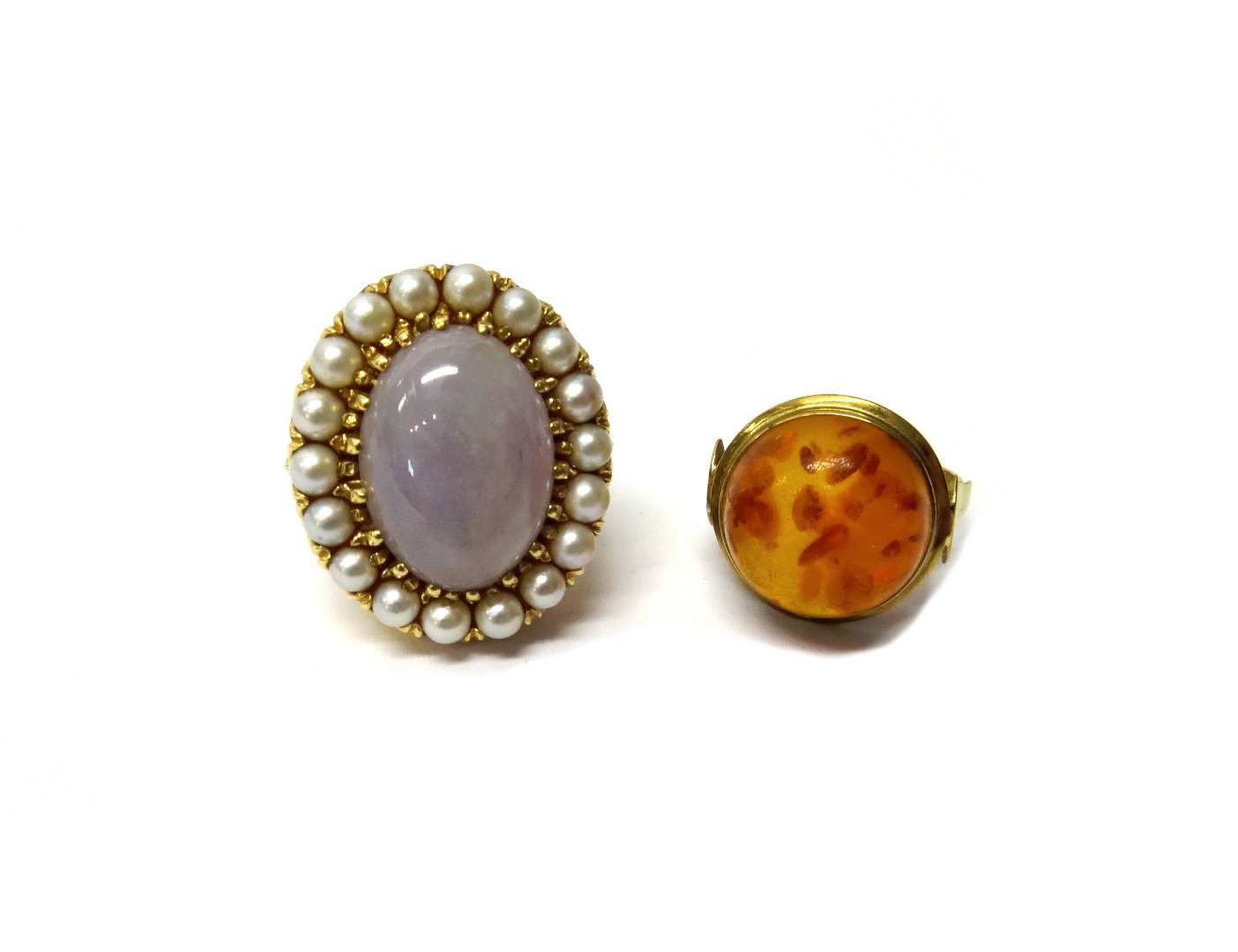 Appraisal: A gold lavender coloured jade and cultured pearl set ring