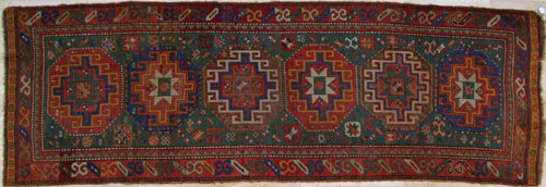 Appraisal: Kazak runner ca with medallions on a green field with