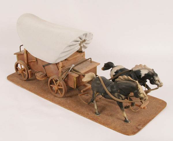 Appraisal: Horse and covered wagon model tandem hitch pulling equipped conestoga