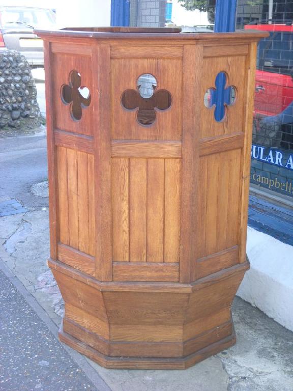 Appraisal: A solid medium oak church pulpit octagonal shape with pierced