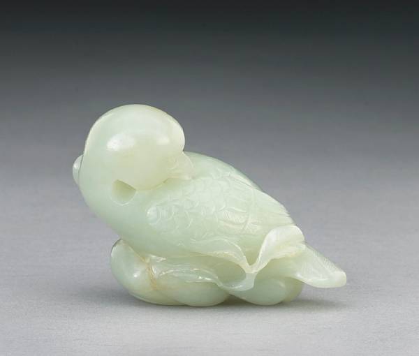 Appraisal: A carved nephrite model of a parrot Ming Dynasty The