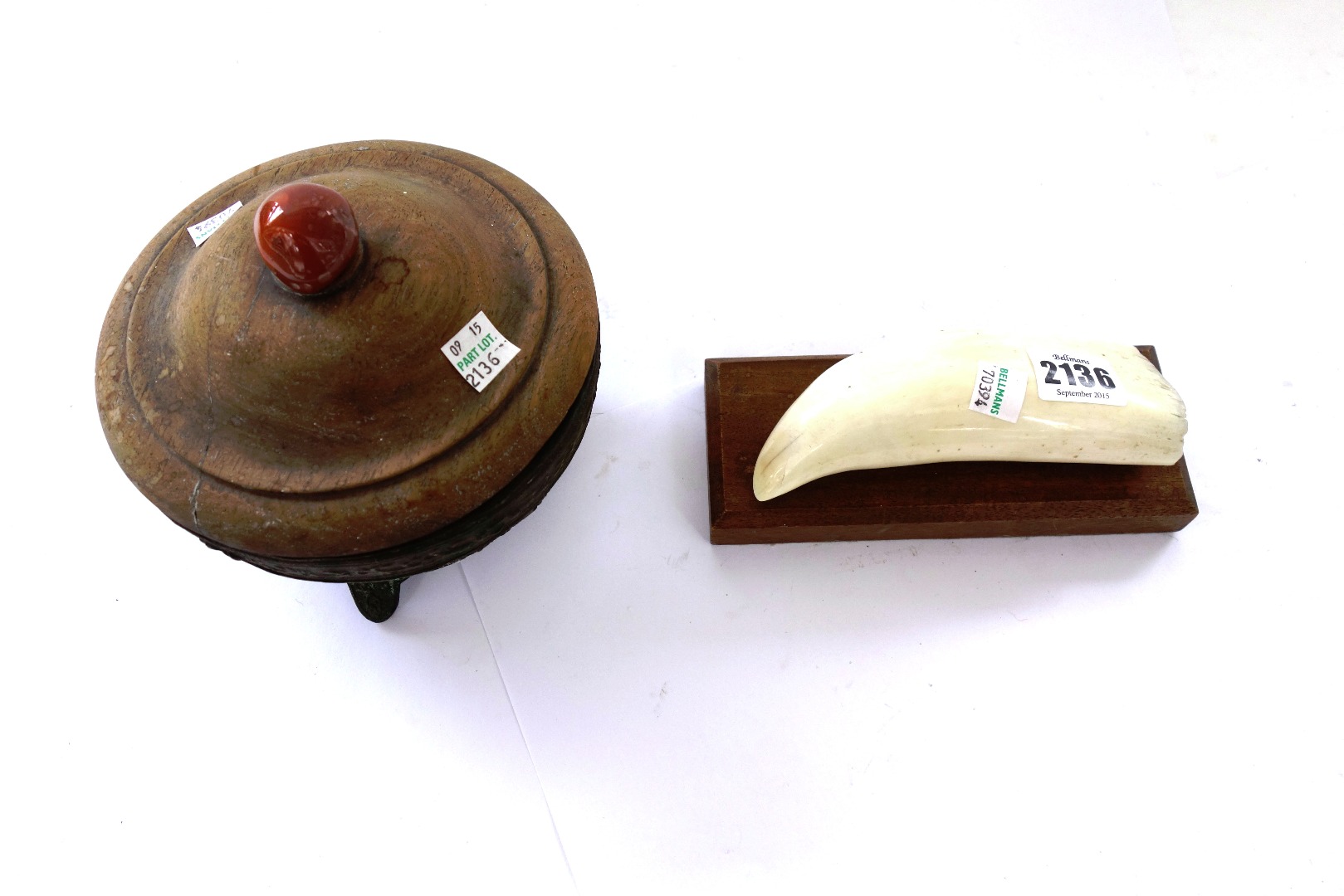 Appraisal: A whale's tooth mid th century cm mounted on a