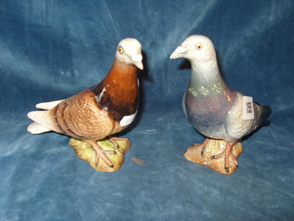 Appraisal: Two Beswick models of pigeons one with grey plumage one