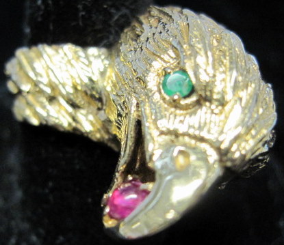 Appraisal: karat yellow gold ruby and emerald 'eagle' ring Textured 'eagle