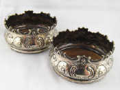 Appraisal: An impressive pair of heavily silver plated decanter coasters with