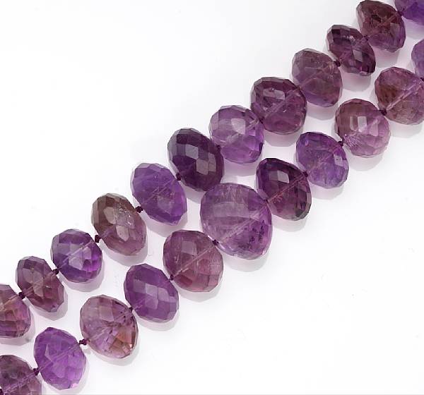 Appraisal: Two amethyst faceted bead necklaces mounted in fourteen karat gold