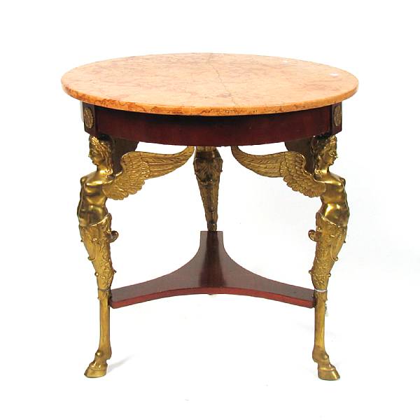 Appraisal: An Empire style gilt bronze mounted mahogany center table with