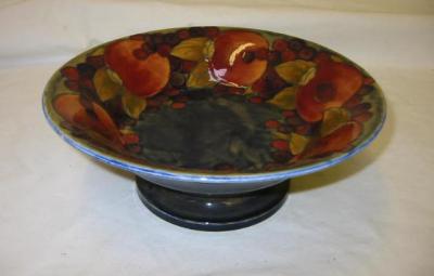 Appraisal: A WALTER MOORCROFT POTTERY FRUIT BOWL of circular form the