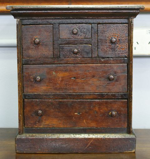 Appraisal: An Australian pine and cedar miniature piece chest of drawers