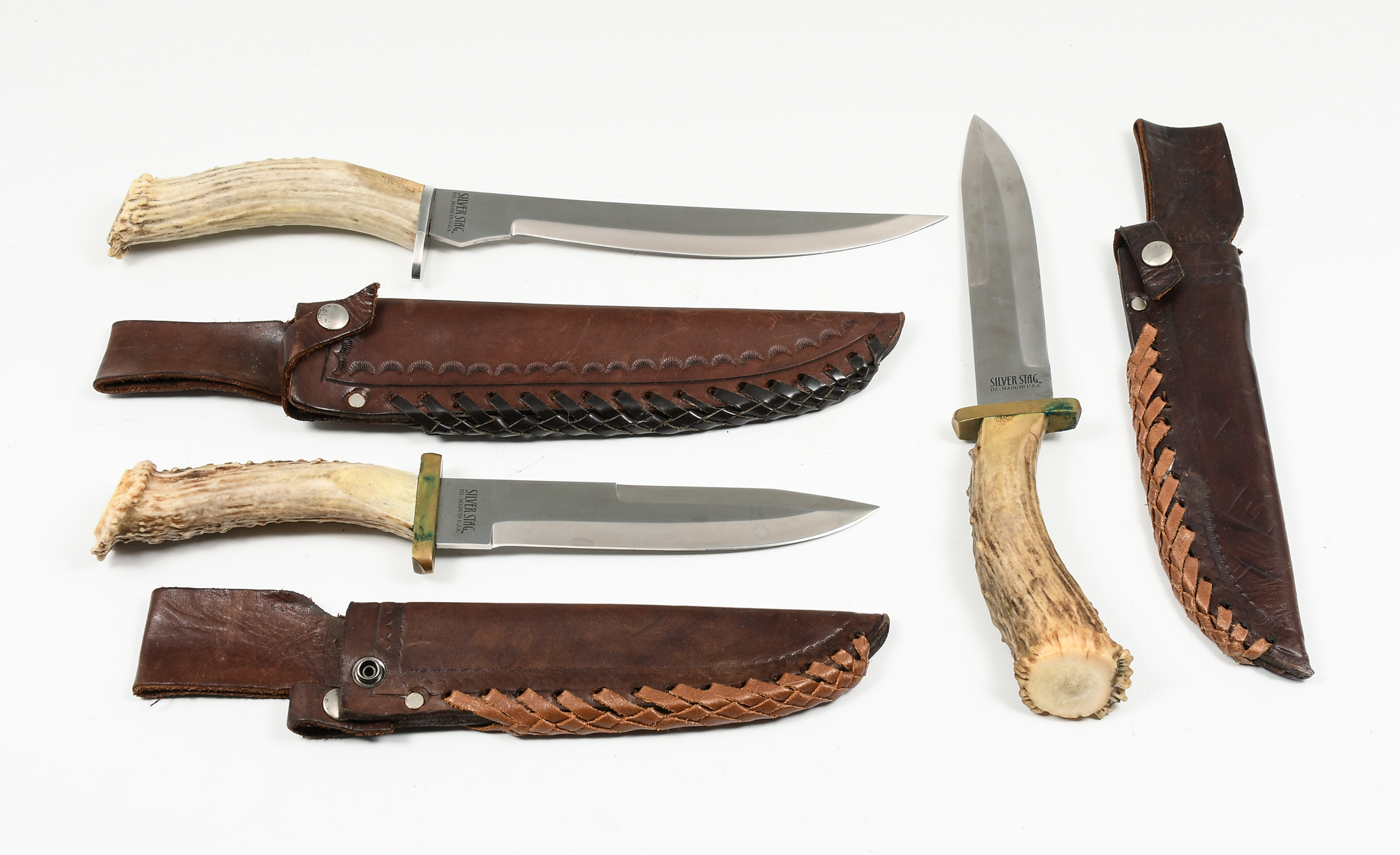 Appraisal: THREE SILVER STAG HORN HANDLE HUNTING KNIVES Two knives are