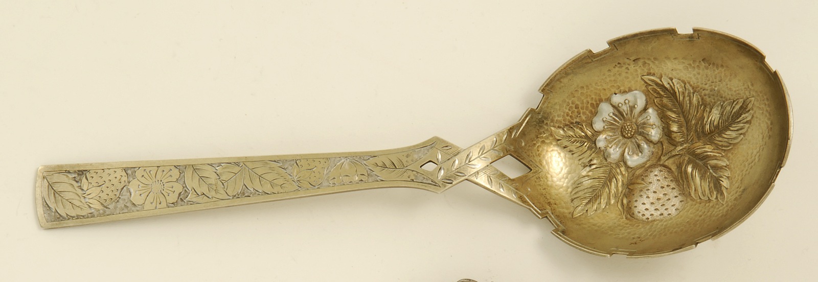 Appraisal: GILT SILVER BERRY SPOON BY GEORGE R SHREVE CO OF