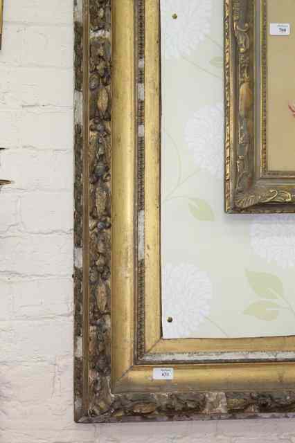 Appraisal: A LARGE VICTORIAN GILT GESSO MOULDED FRAME with oak and