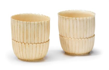 Appraisal: Pair of Chinese elephant ivory foliate form cups th century