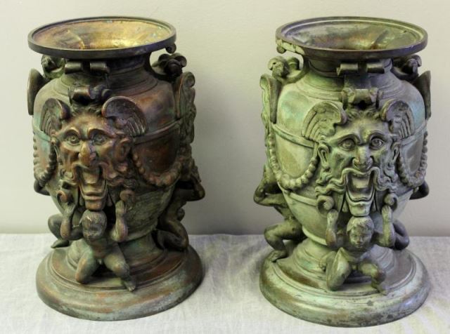 Appraisal: Pair of Antique Patinated Bronze Ornate FiguralUrns With putti type