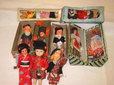 Appraisal: Seven boxed plastic costume dolls including Pedigree and Linda dolls