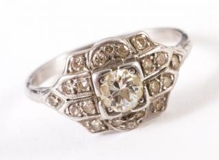 Appraisal: c 's karat white gold filigree ring containing round diamond