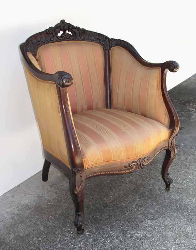 Appraisal: MAHOGANY CARVED GENTLEMAN'S ARM CHAIR Carved and pierced top rail