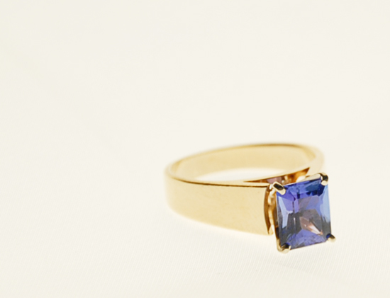 Appraisal: A Gold and Tanzanite Ring K marked yellow gold ring