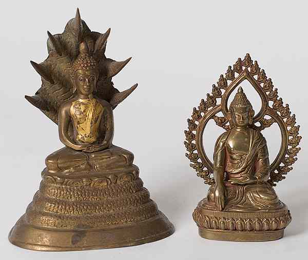 Appraisal: Thai Gilt Metal Buddhas Thai includes two gilt metal buddhas