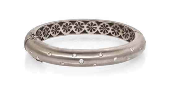 Appraisal: A Karat White Gold and Diamond Bangle Bracelet containing round