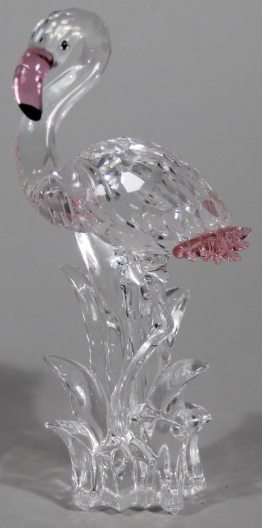 Appraisal: A Swarovski crystal two-coloured flamingo in pink and clear glass