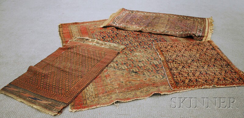 Appraisal: Four Oriental Rugs th century a Hamadan ft x ft