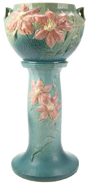 Appraisal: A Roseville glazed earthenware Clematis jardiniere and stand model -