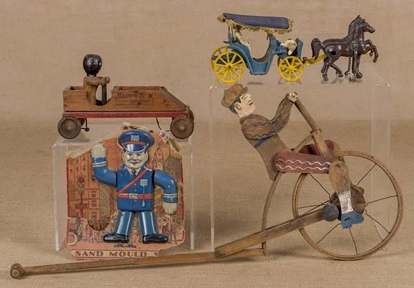 Appraisal: Painted wood bicycle rider push toy '' h toge Painted