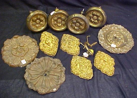 Appraisal: Curtain tie backs two sets of four stamped metal one