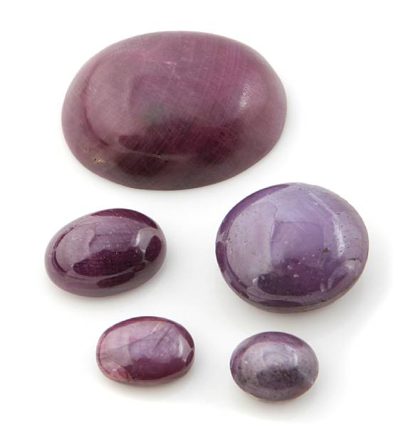 Appraisal: Day TwoNatural History An oval cabochon of deep slightly purplish-red