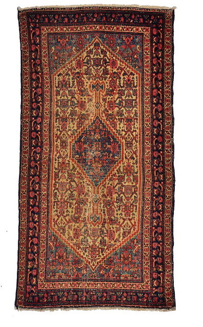 Appraisal: AN OLD SENNEH WHITE GROUND MAT with a central medallion