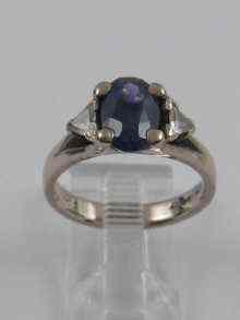 Appraisal: A sapphire and diamond ring the shoulders set with triangular