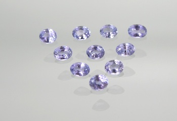 Appraisal: A Group of Unmounted Blue Tanzanites There are oval faceted