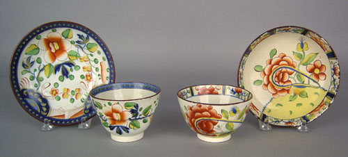 Appraisal: Two Gaudy Dutch cups and saucers th c in the