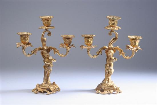 Appraisal: PAIR FRENCH BRONZE DOR THREE-LIGHT FIGURAL CANDELABRA circa Modelled as